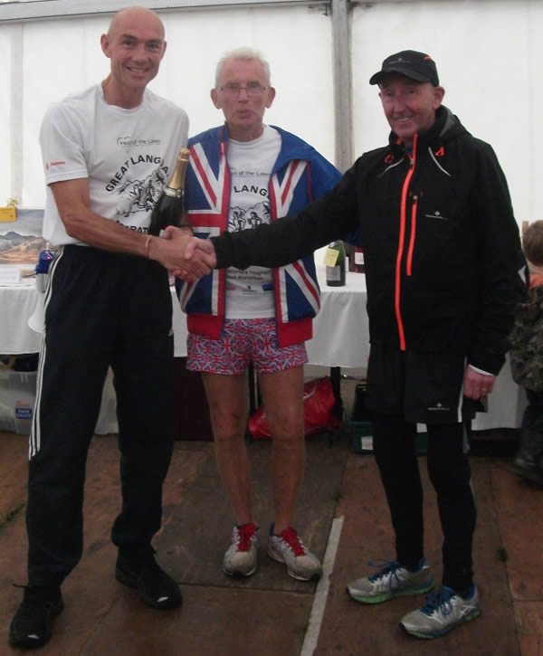 Steve Edwards receives award at Langdale Marathon after 600th full marathon
