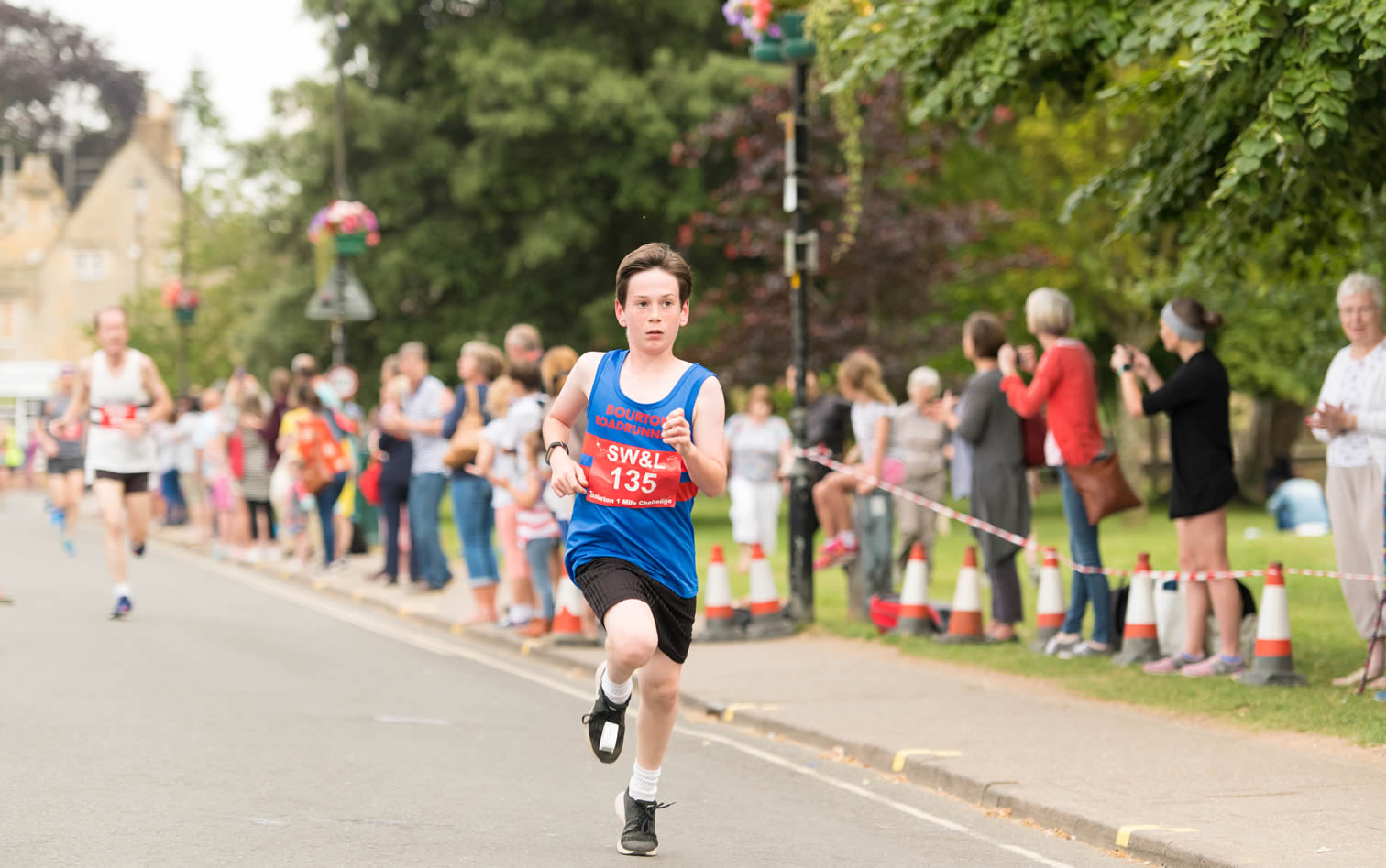 Jonathon Cook of Bourton Roadrunners Juniors - Bourton 1 Mile 13-07-2019