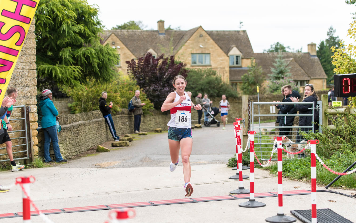 Chelsea Baker of Bristol & West AC, Winning Lady of the 2024 Bourton Half - 29th September 2024