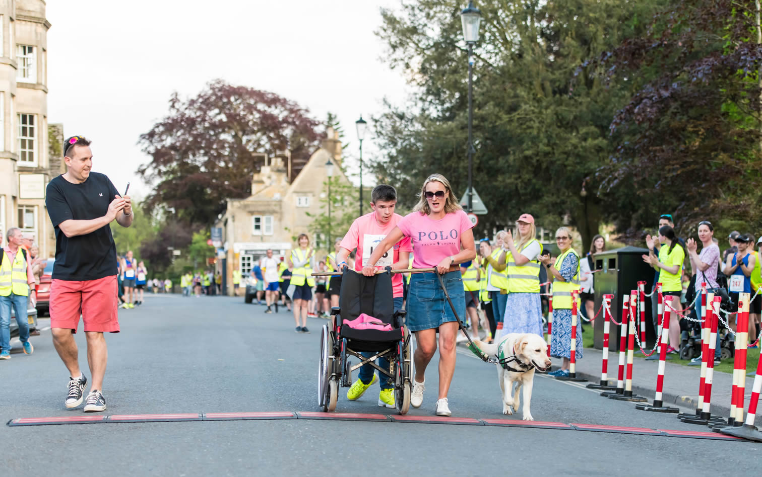 Felix Thompson, with mum and his dog - an ever-present participant at Bourton Mile - 10-05-2024